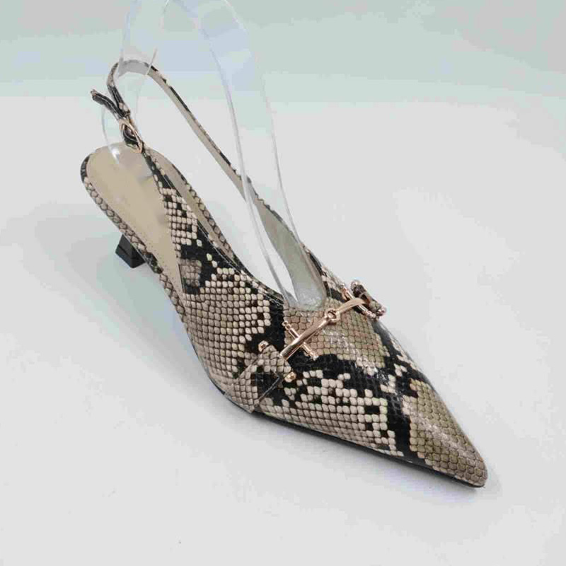Elongated Point Toe Snake Leather Pump