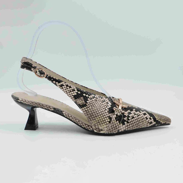 Elongated Point Toe Snake Leather Pump